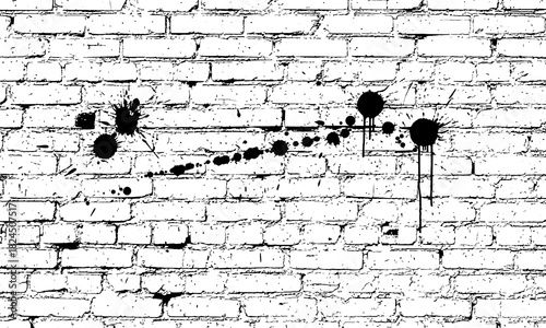 Black Paint Splatters on White Brick Wall.