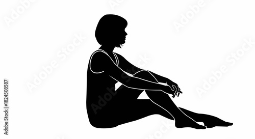 Silhouette of a woman sitting and contemplating in deep thought.