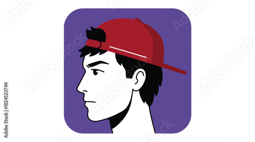 Young man in red cap looking forward with determination.