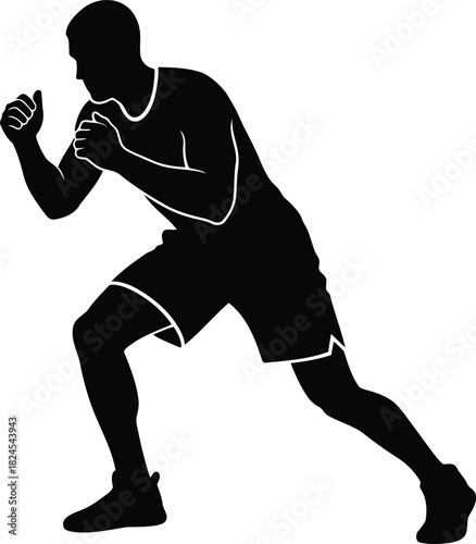 Silhouette of a male fighter in a defensive stance ready for combat or training