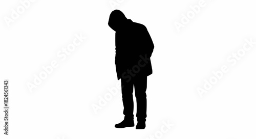 Silhouette of a person with a hood looking down in contemplation.