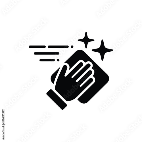 Hand wiping surface with cleaning cloth and sparkles