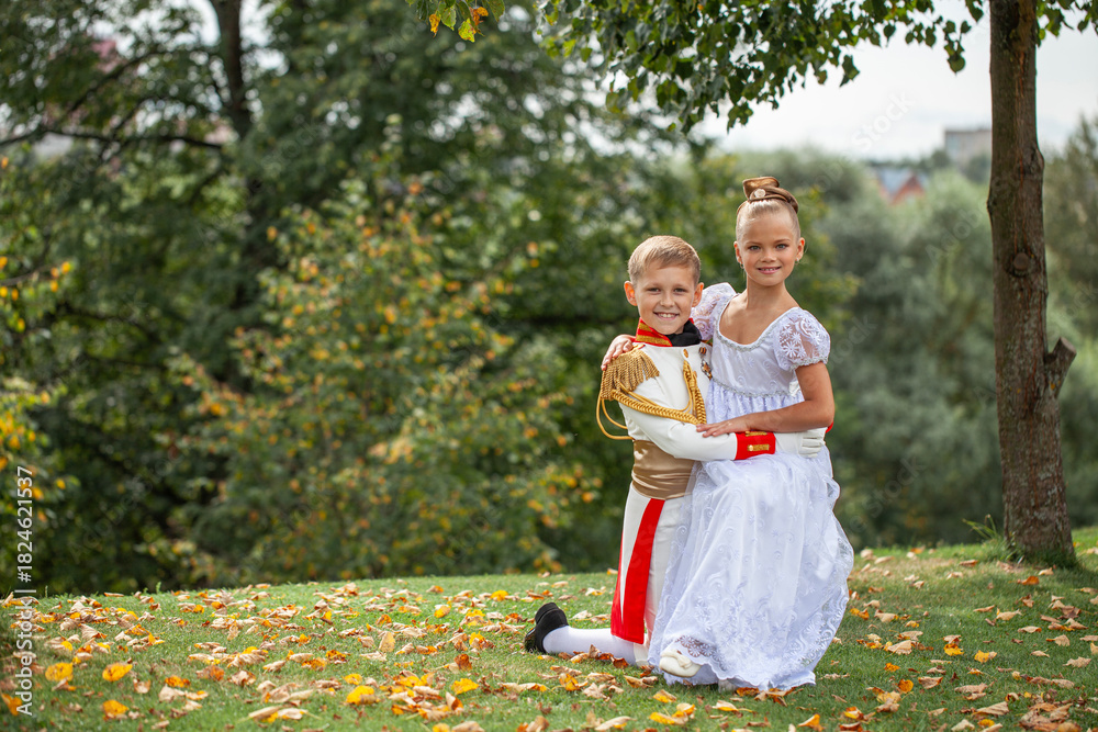 Fototapeta premium A children dancing couple dressed as characters from the novel War and Peace