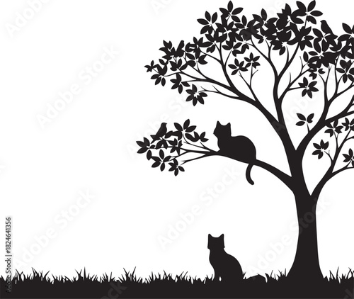Silhouette of two cats in a tree and grass scene with a natural outdoor feel
