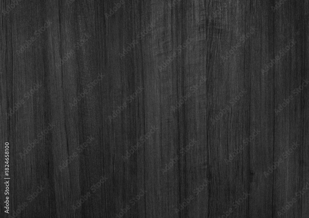 Fototapeta premium Dark Black Teak Wood Texture Background | Close-up of Natural Polished Veneer with Vertical Grain Pattern and Monochrome | Elegant Interior Design Material.