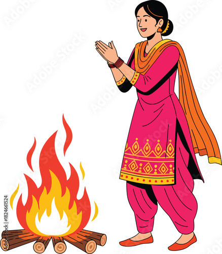 Indian woman in traditional pink attire celebrating a cultural festival by a vibrant bonfire.