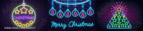 Neon christmas decorations on brick wall featuring ornaments and christmas tree shapes and merry christmas text