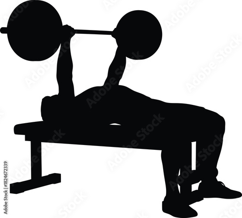Silhouette of a man performing a bench press exercise