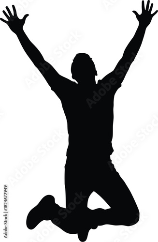 Silhouette of a happy person jumping with arms raised