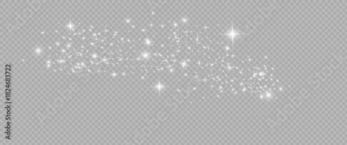 The dust sparks and white stars shine with special light. Vector sparkles on a transparent background. Christmas light effect.