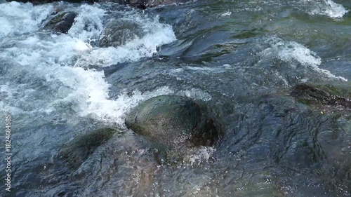 water flowing over rocks