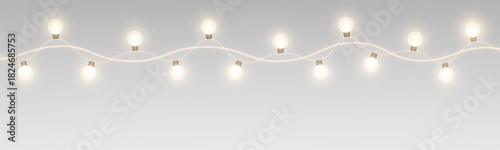 Fairy lights and decorative bulbs along a winter garland. Lamps, banners, and shiny ribbons with glowing festive effects.
