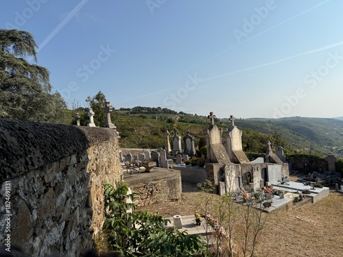 Ancient cemetery architecture under bright sky