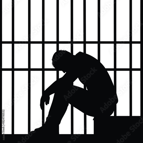 Silhouette of a sad person sitting behind prison bars