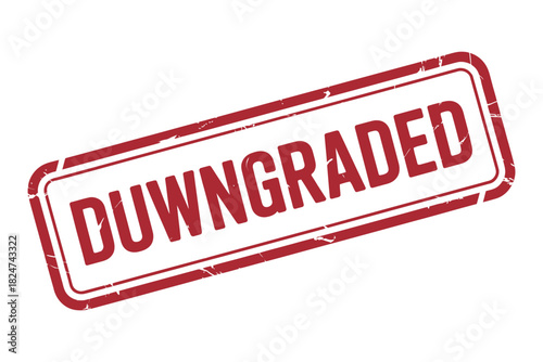 A red rubber stamp with the word DOWGRADED imprinted on a white background.
