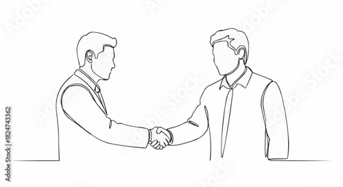 Business handshake agreement between two individuals representing cooperation and success.