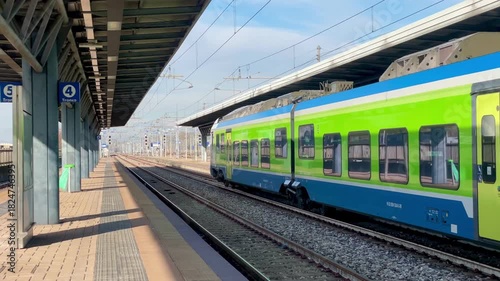 Wallpaper Mural Green regional train waiting in Milan station. Italy, Lombardy Torontodigital.ca