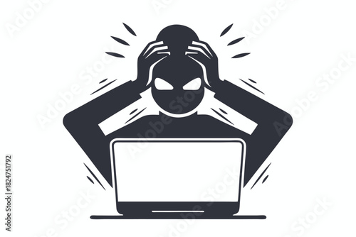 Frustrated person grasps head in front of laptop, seemingly struggling with technical difficulties