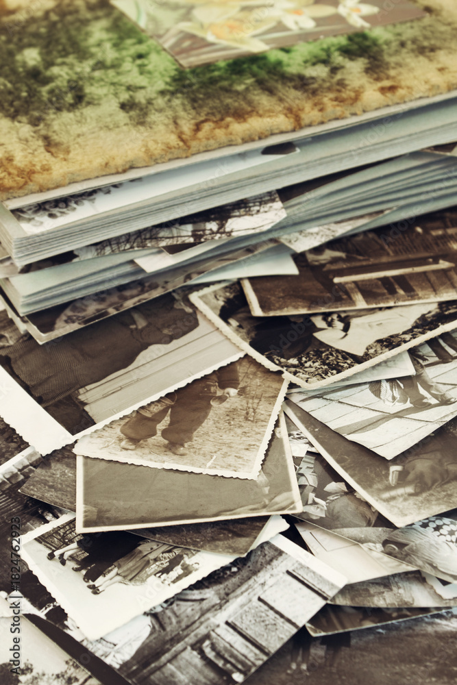 Fototapeta premium Vintage photograph album and amateur photos 1950s-1970s