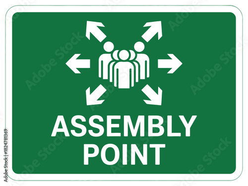 An assembly point sign indicates a designated safe meeting place in case of emergency.