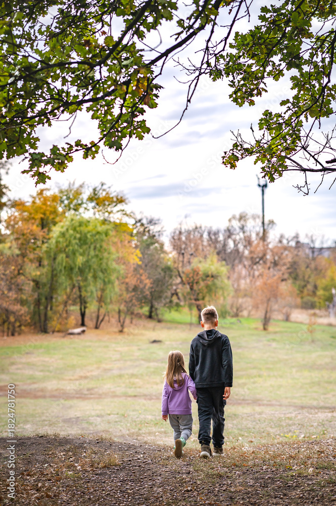 Fototapeta premium children are walking in the park