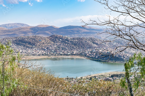 Cochabamba cityscape with laguna alalay and mountains