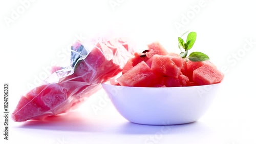 frozen watermelon in a vacuum bag and fresh in a plate