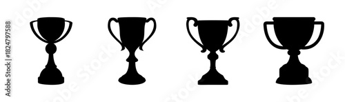 Four black trophy cup silhouettes representing victory and success
