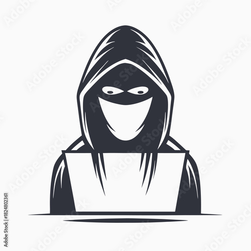 Masked figure in a hoodie works on a computer, creating an ominous and stark image