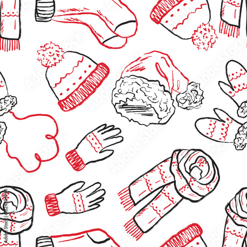 Hand drawn winter warm accessories seamless pattern. Vector sketch illustration in vintage crayon charcoal style. Knitted hat, scarf, gloves, mittens, santa hat and christmas stockings