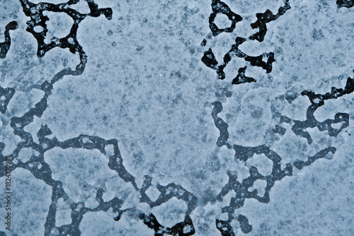 abstract texture of frozen wet dust and dirt on window glass