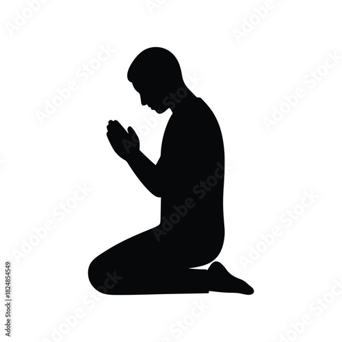 Black Silhouette of Kneeling Person in Prayer