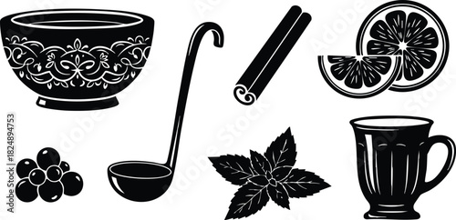 Traditional spice and tea set with bowl ladle cinnamon star anise and citrus slices