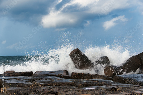 waves crashing on rocks