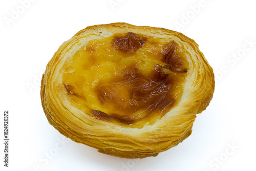 Delightful golden Portuguese egg tart showcasing a flaky crust and rich caramelized custard.