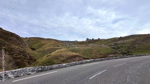 Driving the Col du Pourtalet, France down to Formigal in Spain. Mountain pass in the French Pyrenees massif, symbol of the Tour de France in Bearn, France.