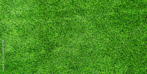 Artificial grass texture background with bright green synthetic turf and detailed pattern