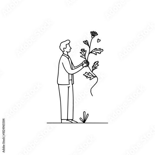 Man holding a flowering plant, symbolizing growth and care