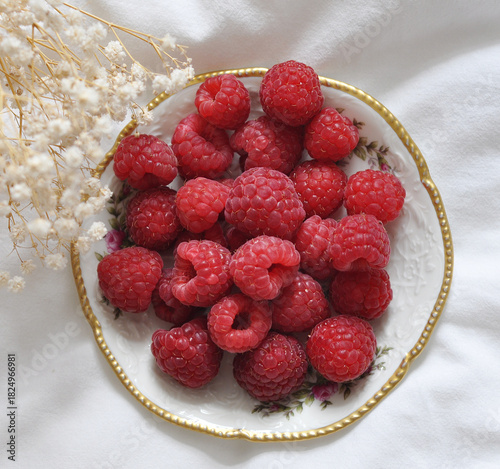 fresh raspberries on a plate