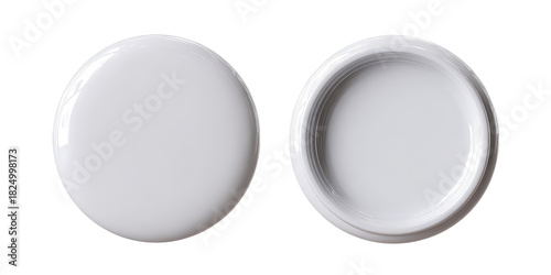 A close-up, high-angle shot of two circular, white objects against a black background. One is solid, and the other has a well-defined recessed space