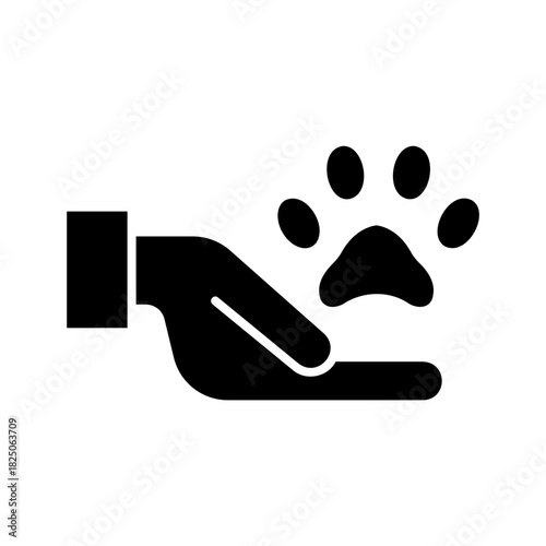 Hand giving treat to pet