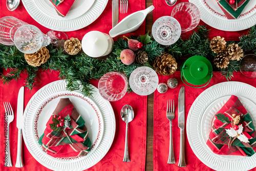 Above view of a beautifully decorated table setting for the Christmas holidays.