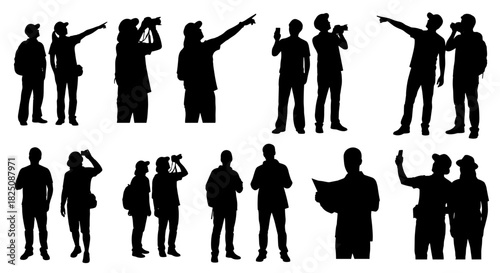 Silhouetted tourists exploring, pointing, looking, and using map for navigation on vacation