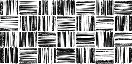 Monochrome abstract background featuring a hand-drawn geometric pattern of sketchy lines in a checkerboard layout