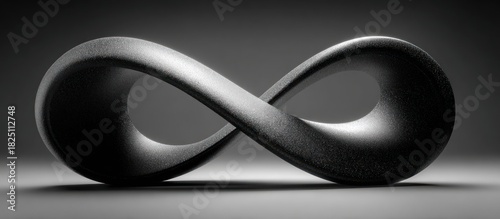 A grayscale, sculpted infinity symbol with a textured, metallic appearance