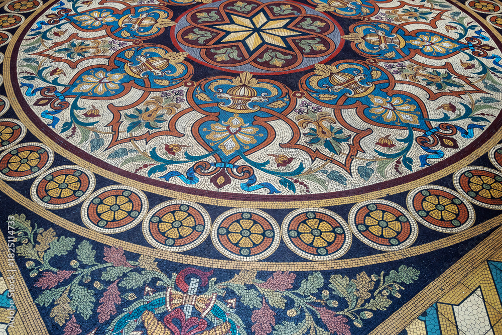 Obraz premium Decorative Portuguese tile mosaic for floor, built in 19th-century neoclassical style, with Tuscan and English neo-Palladian architecture. Portugal, 2023