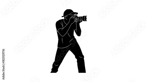 Silhouette of a photographer taking a picture with a camera.