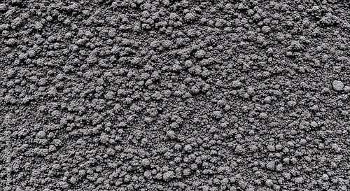 Gray gravel stones close up rough texture background.