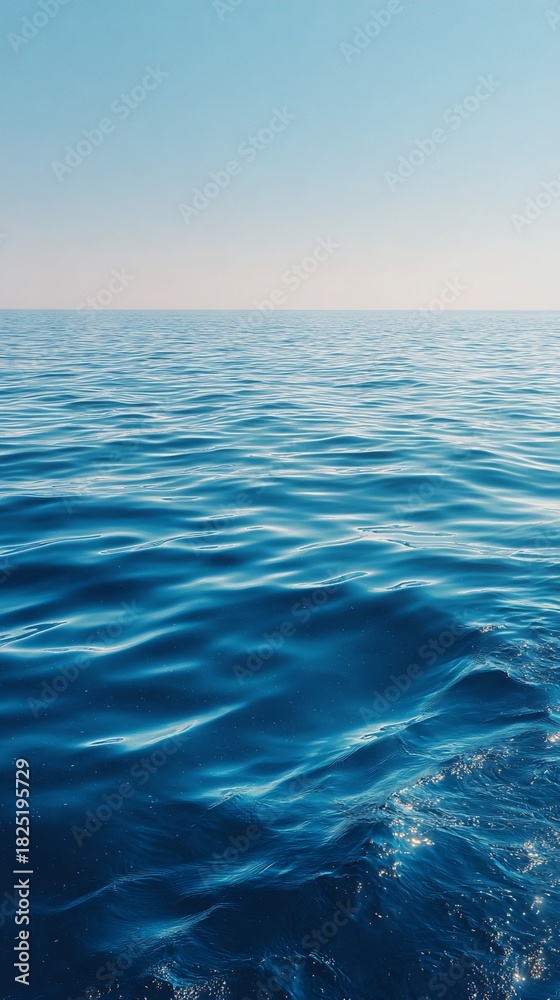 Fototapeta premium Azure Ocean Water Surface with Reflected Sunlight Sparkling in the Middle of the Day Clear Sky Reflecting on Gentle Wave Pattern Textured Seascape Scenic Serene Wide Angle