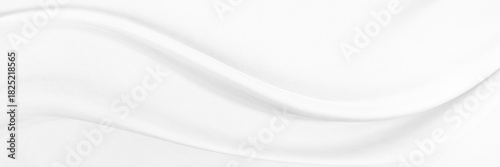 White gray satin texture that is white silver fabric silk panorama background with beautiful soft blur pattern natural.